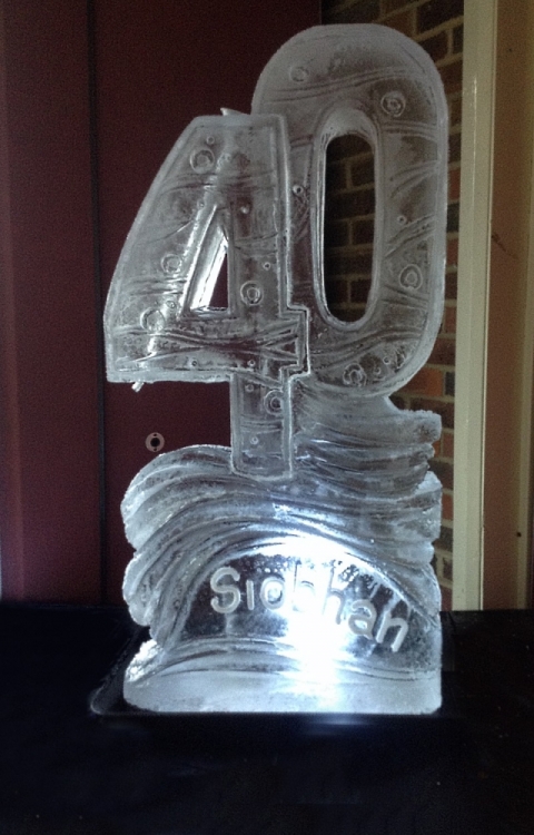 40 with name carved in the base Vodka Luge from Passion for Ice